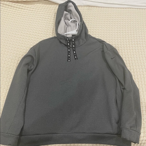 Small Gray Nike sweater. Lightly used, it has a front pouch hidden on the side. - Picture 5 of 5